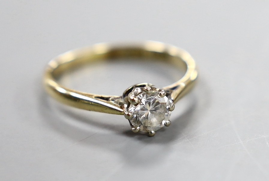 An 18ct, plat and solitaire diamond set ring, size Q, gross weight 2.4 grams.